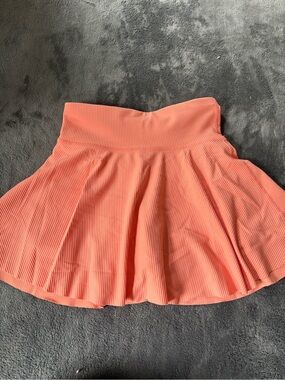 High-Waist Flared Ribbed Skirt in Coral Pink